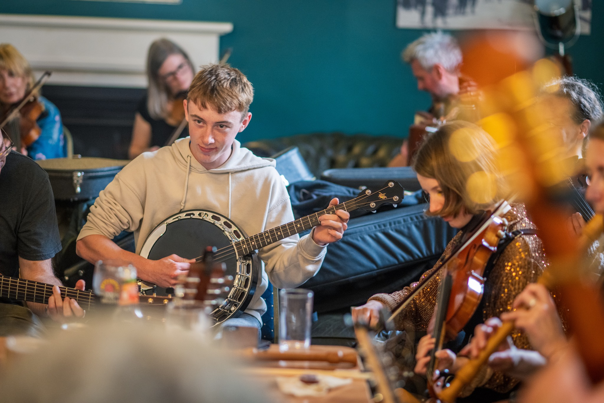 a boy plays an instrument