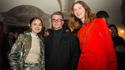 Maisie Murray (left) with her dad, and Brighter Sound music leader Lucy Wallace (right)