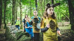 Group of children walking in woods