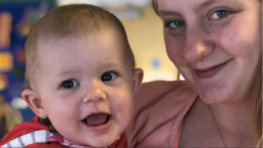 mum and baby smiling