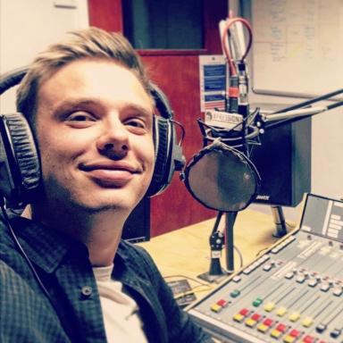 man wearing headphones in a record studio