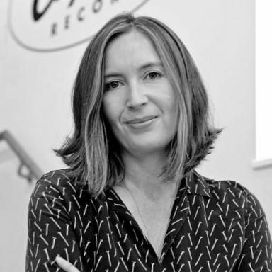 black and white photo of woman with shoulder length hair