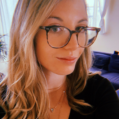 blonde woman with glasses